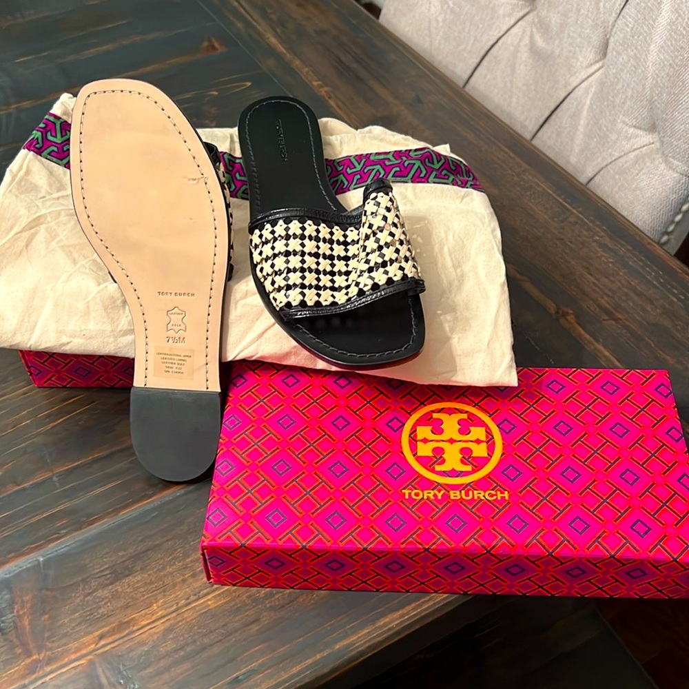 Tory Burch slides. Woman’s size 7 1/2 new. Box and bag included.